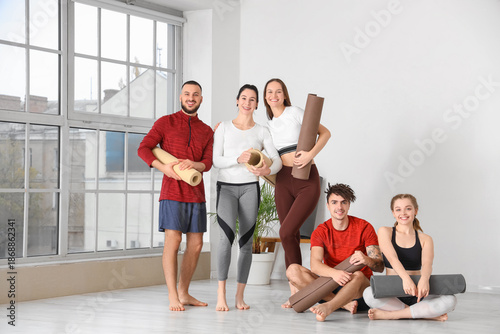 Group of sporty people with...
