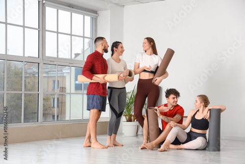 Group of sporty people with...