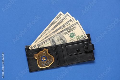 Wallet with money and polic...