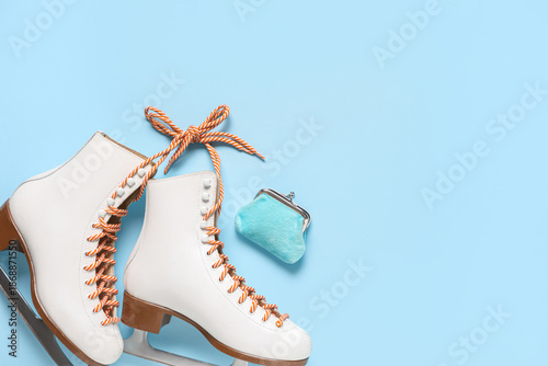 Wallet with ice skates on b...