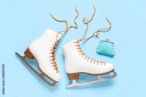 Wallet with ice skates on b...