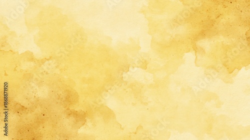 Abstract yellow watercolor background with soft texture and organic patterns.
