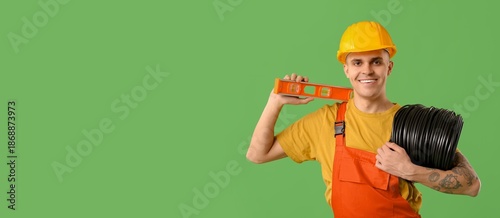 Young male electrician on g...