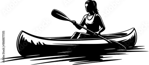silhouette of a woman kayaking