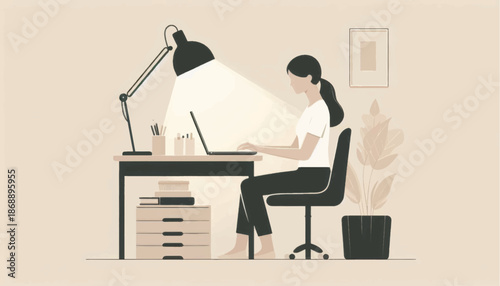 Woman Working on Laptop at Desk 2.