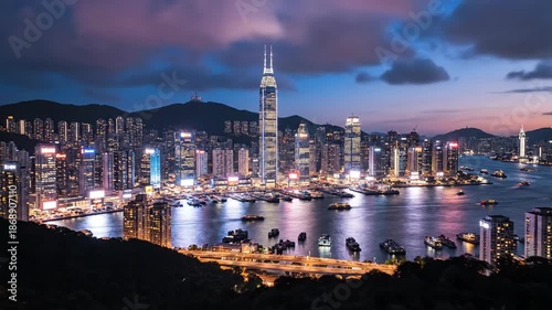 Stunning Hong Kong Skyline at Dusk with Illuminated Skyscrapers and Victoria Harbour.