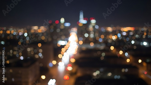 Night Cityscape Blurred with Colorful Bokeh Lights and Streaks