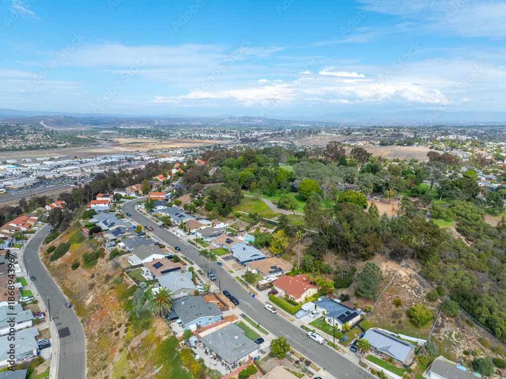 Fototapeta premium Aerial view of middle class houses in the valley of Oceanside town in San Diego, California. USA.