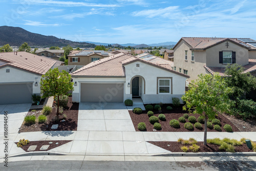 Aerial view of a sprawling neighborhood of family homes in Menifee city in Riverside County, California, United States