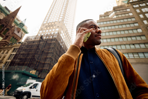 Man makes a call on the street