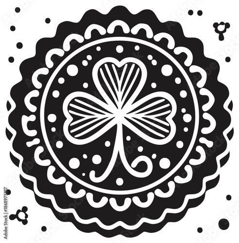 Decorative circular emblem with a stylized shamrock and dots on a black background