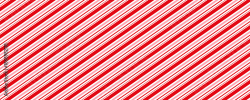 Vertical red and white stripes background. Seamless and repeating pattern.