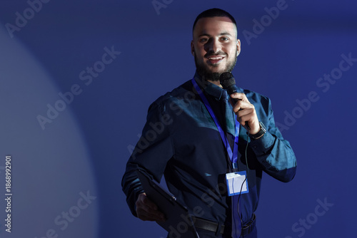 Young business speaker cond...