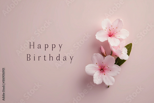 Flowers with the words Happy Birthday on a pastel background for celebrations and greetings during special occasions