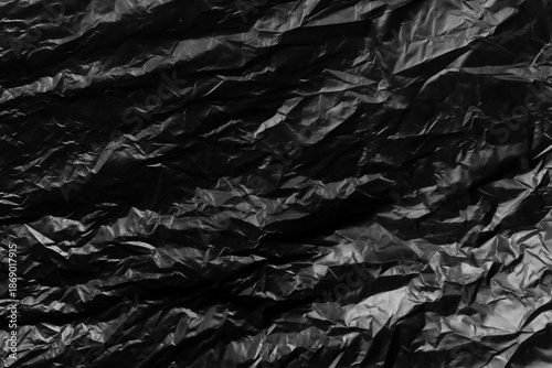 garbage bag is crumpled dark black