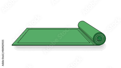 Green yoga mat rolled out on floor for exercise and meditation