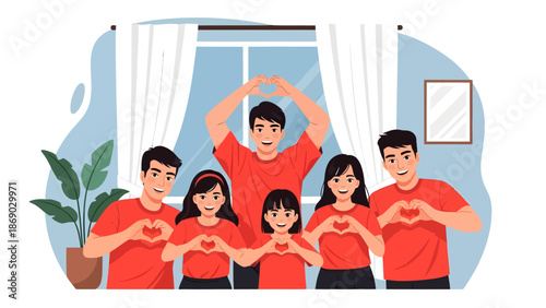 Family of six wearing red shirts making heart shapes with their hands together