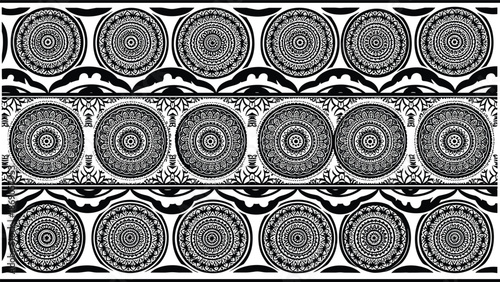 Black and white ornamental mandala border pattern with repeating circular floral motifs, decorative ethnic textile design seamless horizontal composition