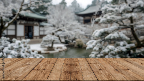 Rustic wooden table in blurred japanese winter garden