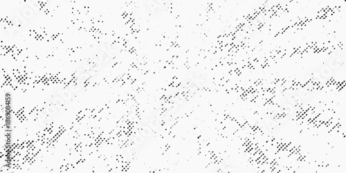 Abstract black and white speckled pattern resembling distorted writing