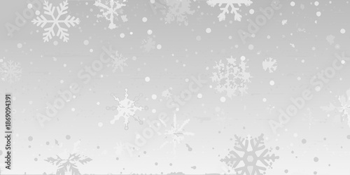 Falling snowflakes create a gentle winter scene with a soft muted palette