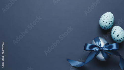 Gift background bow minimal egg blue dark paint stylish easter colours create modern holiday mood with speckled egg decoration and ribbon space for greeting card or seasonal banner design