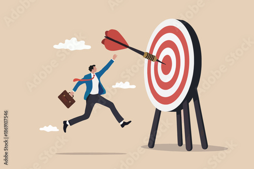 Businessman successfully hitting the target, illustrating business goal achievement and success