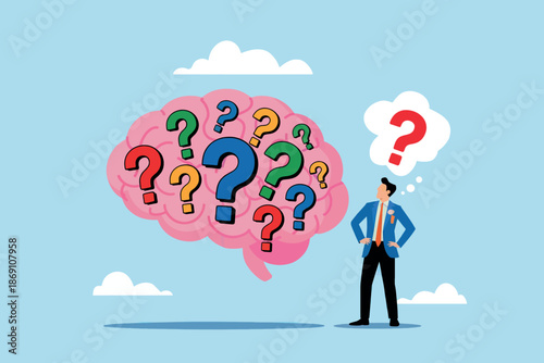 Businessman pondering complex questions and solutions with a brain full of uncertainty