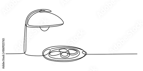 A continuous line drawing illustrating a food warming lamp above a tray of food items