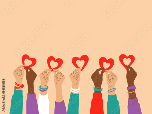 Diverse hands holding red heart shapes on peach background with colorful bracelets