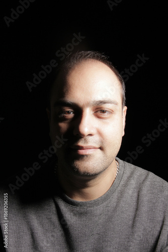 Wallpaper Mural Portrait of a middle-aged Iranian man with studio lighting Torontodigital.ca