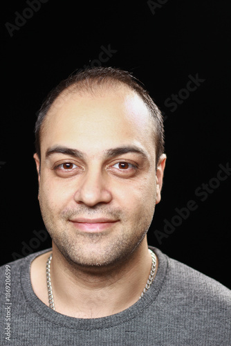 Wallpaper Mural Portrait of a middle-aged Iranian man with studio lighting Torontodigital.ca
