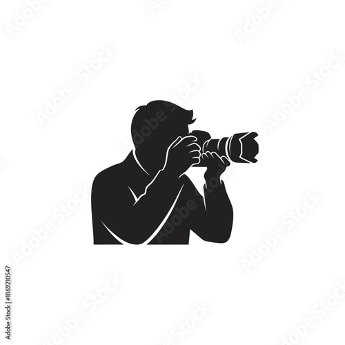 Silhouette of a photographer holding a professional camera, capturing a moment