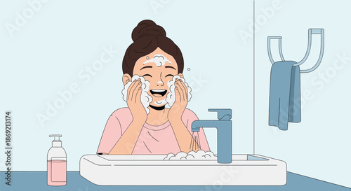 Happy young girl washing her face with soap foam at bathroom sink for daily skincare and hygiene routine at home.