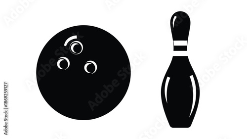 A black bowling ball and pin displayed in a striking silhouette