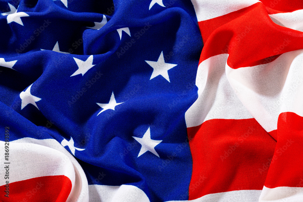 Fototapeta premium Full frame shot of crumpled usa flag fabric with stars and stripes