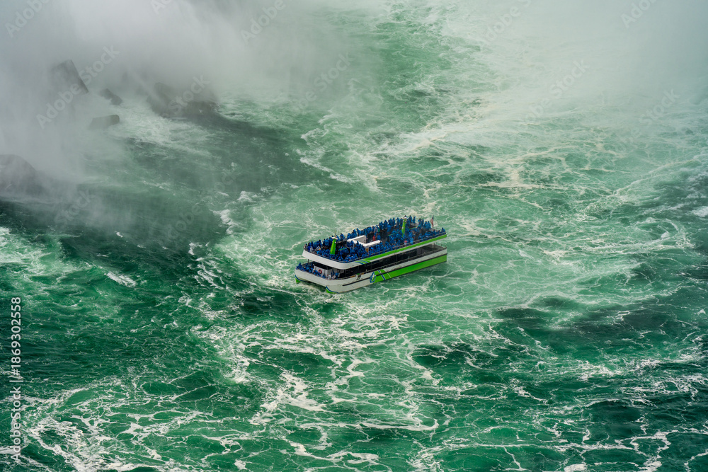 Obraz premium Boat cruise under Niagara Falls, aerial view