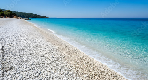 White pebble beach and turquoise sea water on Thassos Island, Gr