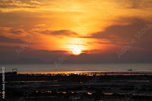 The sunrise above the horizontal line of the sea