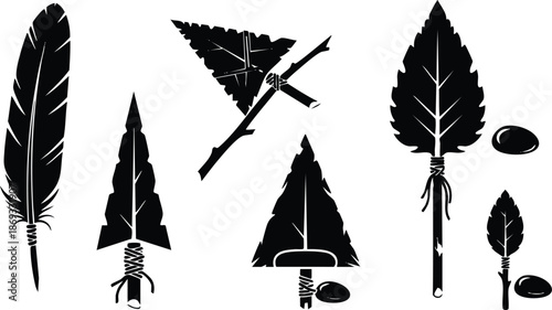 Black silhouette vector set of primitive arrowheads and spears with wired sticks stone tips varied size traditional hunting weapons icons on white background