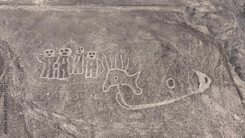 Aerial- Nasca lines (owl, fish, bee) in the desert of Peru