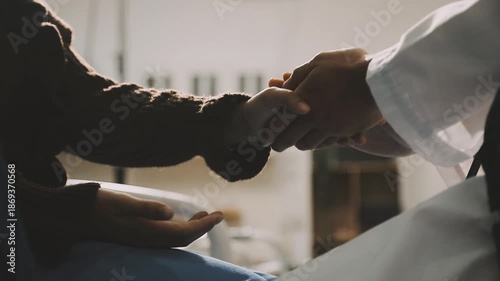 female doctor hold hand of woman patient give comfort, express health care sympathy, medical help trust support encourage reassure infertile patient at medical visit, closeup view
