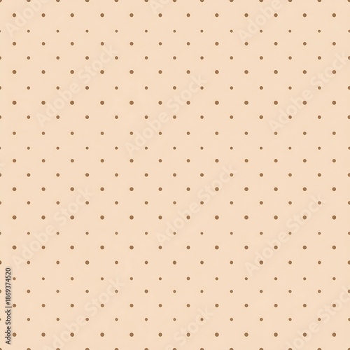 Beige background adorned with a uniform pattern of tiny, scattered brown dots