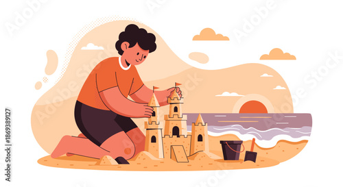 Young Man Building Sandcastle on Beach.