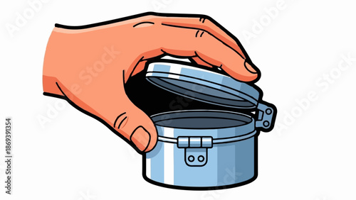 Hand opens metallic container with hinge and clasp