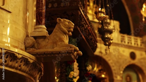 Sofia, Bulgaria - December 29, 2025: Marble sculpture of a lion in the cathedral. Cathedral of St. Alexander Nevsky. Interior decoration of the Orthodox cathedral, elements. Decor. Sculpture of a lion