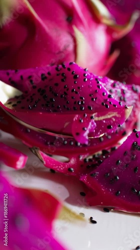 Wallpaper Mural Sliced dragon fruit with vibrant magenta flesh and scattered black seeds Torontodigital.ca