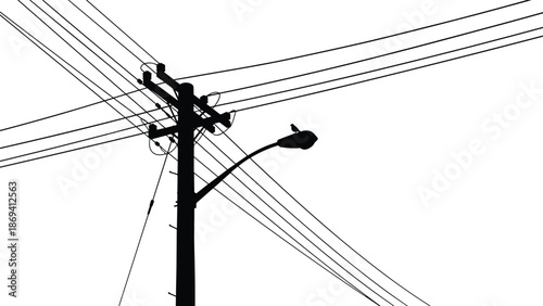 Silhouette utility pole with power lines and street light, urban infrastructure, minimal black and white sky background