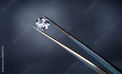 Konstfotografi a diamond in a pair of tweezers