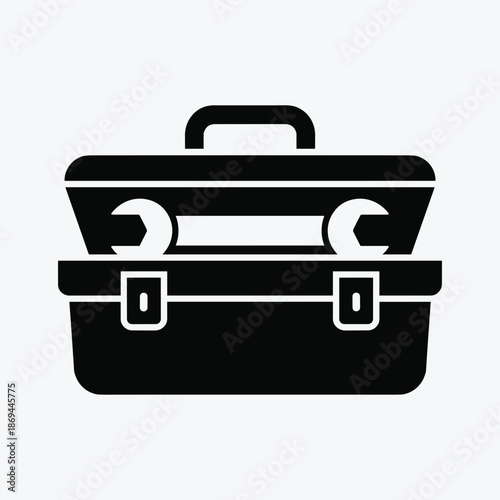 Black toolbox with wrench and handle on tool box adjustable wrench silhouette vector illustration maintenance tools carrying  box isolated on white background.